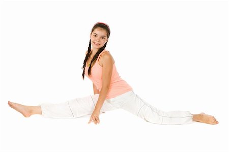 Young girl doing fitness exercises on white background Stock Photo - Budget Royalty-Free & Subscription, Code: 400-04672293