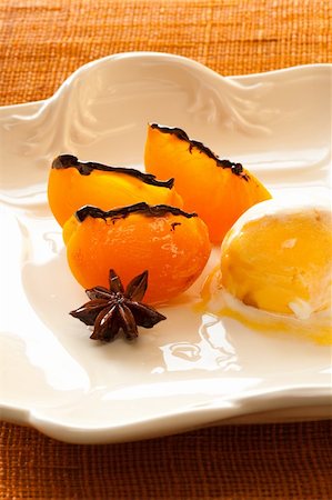 simsearch:400-04781520,k - Ice cream and persimmon with anis star on plate Photographie de stock - Aubaine LD & Abonnement, Code: 400-04672745