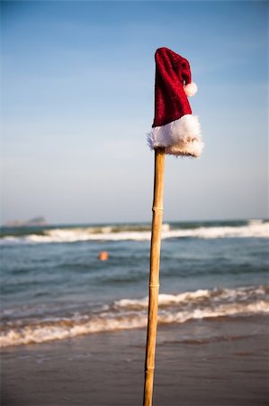 After the party. Christmas hat and swimming man on background. Christmas collection. Stock Photo - Budget Royalty-Free & Subscription, Code: 400-04672825