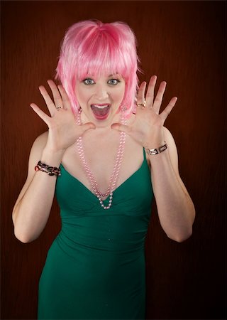 screaming retro woman - Disco dancing woman in green dress and pink hair Stock Photo - Budget Royalty-Free & Subscription, Code: 400-04684169
