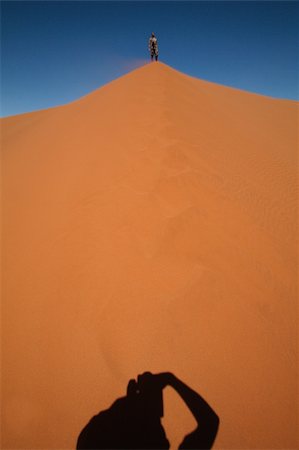 picture of thirsty man in desert - Photographer in action Stock Photo - Budget Royalty-Free & Subscription, Code: 400-04684741