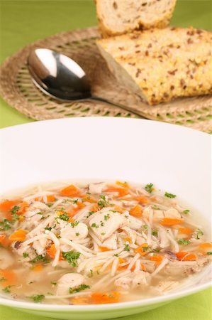 simsearch:400-07481067,k - Chicken soup with pieces of meat, carrot, noodles and parsley Stock Photo - Budget Royalty-Free & Subscription, Code: 400-04684905