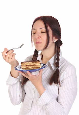 Beautiful woman eating piece of cake on white background Photographie de stock - Aubaine LD & Abonnement, Code: 400-04685049