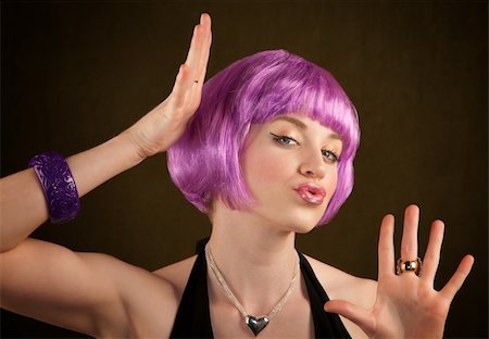 simsearch:400-04685521,k - Portrait of woman with shiny purple hair Photographie de stock - Aubaine LD & Abonnement, Code: 400-04685522