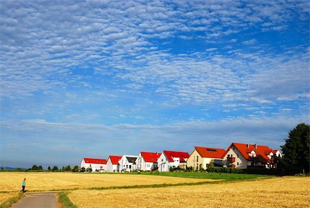 Tranquil landscape - hay fields and house range, south-western Germany Stock Photo - Budget Royalty-Free & Subscription, Code: 400-04685673