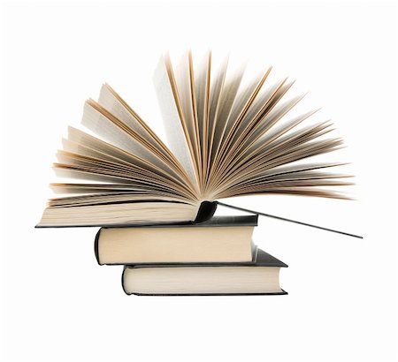 simsearch:400-05734056,k - pile of books with one book open on white background Photographie de stock - Aubaine LD & Abonnement, Code: 400-04686353