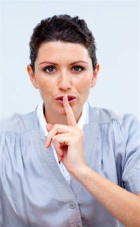 simsearch:400-04238180,k - Serious business woman asking for silence in the office Stockbilder - Microstock & Abonnement, Bildnummer: 400-04686900