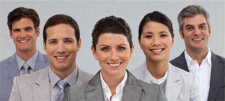 simsearch:6109-06002803,k - Business group showing diversity standing together in front of the camera Stock Photo - Budget Royalty-Free & Subscription, Code: 400-04687151