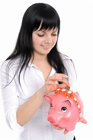 Young beautiful woman standing with piggy bank (money box), isolated on white background Stock Photo - Budget Royalty-Free & Subscription, Code: 400-04687182