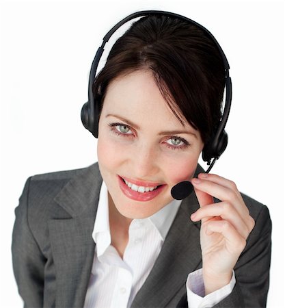 simsearch:400-04801703,k - Close-up of a businesswoman talking on a headset against a white background Foto de stock - Super Valor sin royalties y Suscripción, Código: 400-04687354