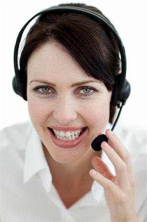 simsearch:400-04801703,k - Businesswoman with headset on smiling at the camera isolated on a white background Foto de stock - Super Valor sin royalties y Suscripción, Código: 400-04687363