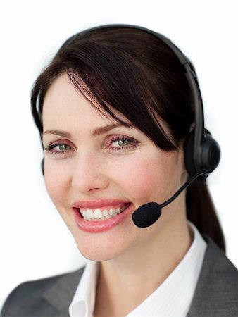 simsearch:400-04119293,k - Assertive businesswoman with headset on isolated on a white background Fotografie stock - Microstock e Abbonamento, Codice: 400-04687376