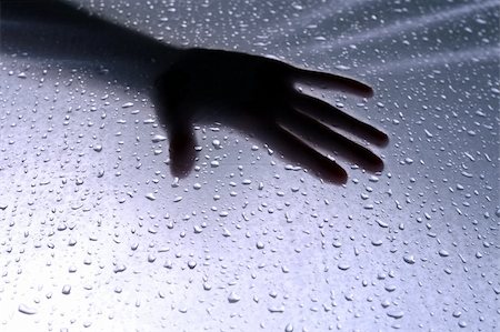 Hand is touching wet plastic surface Stockbilder - Microstock & Abonnement, Bildnummer: 400-04687532