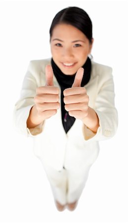 simsearch:400-03952911,k - Successful young businesswoman with thumbs up against a white background Stock Photo - Budget Royalty-Free & Subscription, Code: 400-04688165