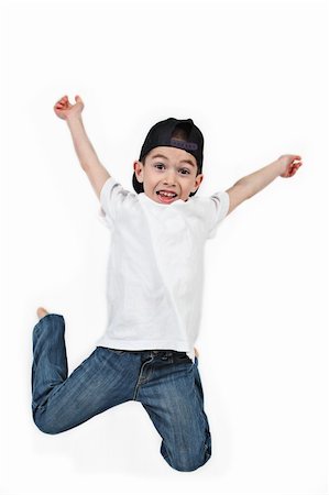 simsearch:400-04850794,k - Little boy jumping on isolated white background Stock Photo - Budget Royalty-Free & Subscription, Code: 400-04688556