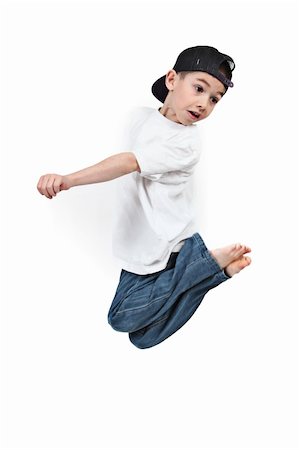 simsearch:400-06139772,k - Little boy jumping on isolated white background Photographie de stock - Aubaine LD & Abonnement, Code: 400-04688558