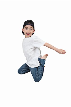 simsearch:400-04850794,k - Little boy jumping on isolated white background Stock Photo - Budget Royalty-Free & Subscription, Code: 400-04688559