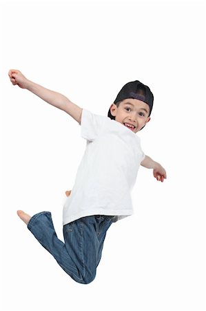 simsearch:400-06139772,k - Little boy jumping on isolated white background Photographie de stock - Aubaine LD & Abonnement, Code: 400-04688560