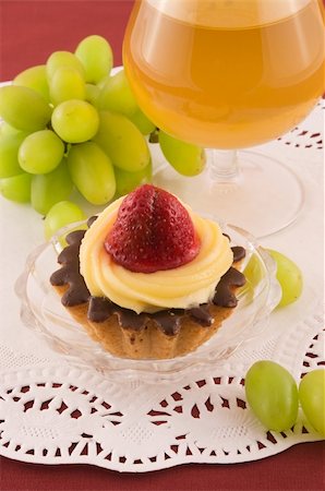 dark chocolate curl - Fresh cake with strawberry, grapes and glass of white wine Stock Photo - Budget Royalty-Free & Subscription, Code: 400-04688985