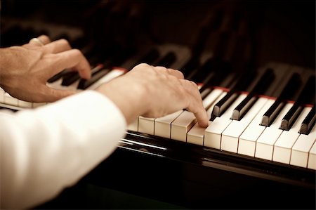 close up of male hands playing piano. Horizontal shape, copy space Stock Photo - Budget Royalty-Free & Subscription, Code: 400-04689069