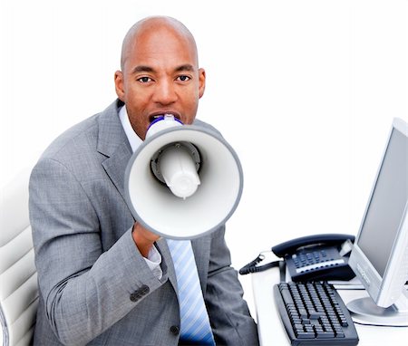 simsearch:400-04126489,k - Angry businessman yelling through a megaphone in the office Stock Photo - Budget Royalty-Free & Subscription, Code: 400-04689137