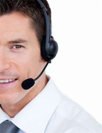 simsearch:400-04188205,k - Portrait of a sales representative man with an headset against white background Stock Photo - Budget Royalty-Free & Subscription, Code: 400-04689143