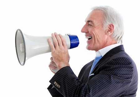 simsearch:400-04126489,k - Senior smiling businessman using a megaphone against a white background Stock Photo - Budget Royalty-Free & Subscription, Code: 400-04689159