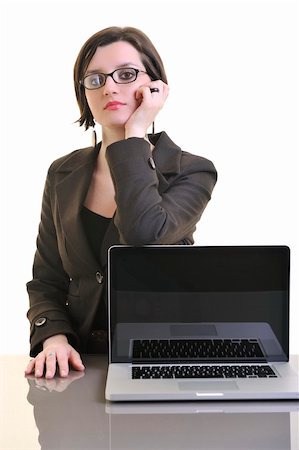 one young business woman isolated on white working on laptop computer Stock Photo - Budget Royalty-Free & Subscription, Code: 400-04680010