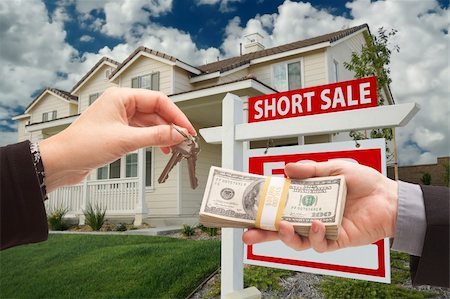 eviction - Handing Over Cash For House Keys and Short Sale Real Estate Sign in Front of Home. Stock Photo - Budget Royalty-Free & Subscription, Code: 400-04680212