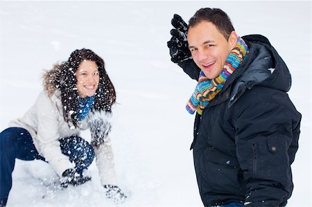 Young couple playing outdoors in the snow. Stock Photo - Budget Royalty-Free & Subscription, Code: 400-04680238