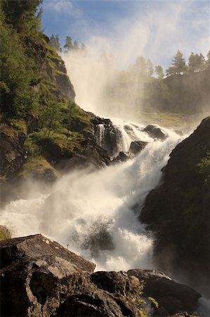 Norwegian Waterfalls on a sunny day Stockbilder - Microstock & Abonnement, Bildnummer: 400-04681197