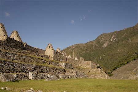 Ancient ruins of Machu Picchu in Peru on a sunny day Fotografie stock - Microstock e Abbonamento, Codice: 400-04681230