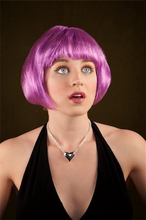simsearch:400-04685521,k - Portrait of woman with shiny purple hair Photographie de stock - Aubaine LD & Abonnement, Code: 400-04681351