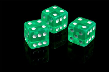 simsearch:400-06911675,k - Three casino dice on a black background Stock Photo - Budget Royalty-Free & Subscription, Code: 400-04681933