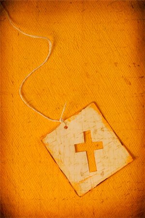 simsearch:400-06087640,k - Close up of handmade paper tag with holy cross Stock Photo - Budget Royalty-Free & Subscription, Code: 400-04682305