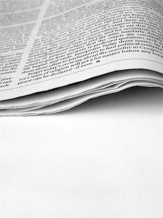 simsearch:400-04823707,k - Close up of new paper article Photographie de stock - Aubaine LD & Abonnement, Code: 400-04682804