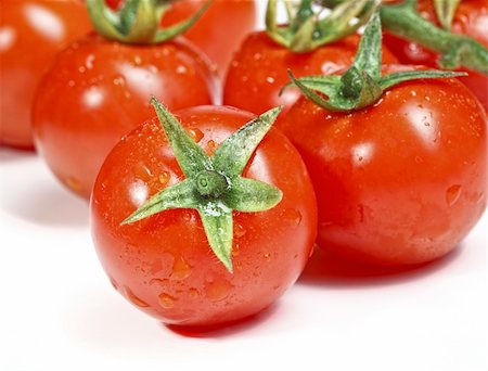simsearch:400-04393823,k - closeup image of red tomatoes on white plane Stockbilder - Microstock & Abonnement, Bildnummer: 400-04682924