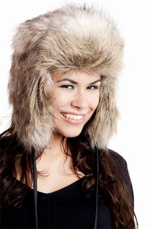 simsearch:400-05712134,k - Adorable young woman with a beautiful smile and wearing a hat Photographie de stock - Aubaine LD & Abonnement, Code: 400-04683159