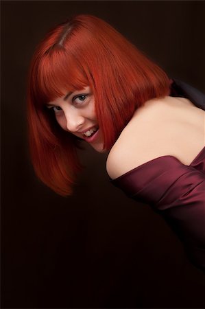 simsearch:400-04651881,k - Portrait of beautiful woman with red hair Photographie de stock - Aubaine LD & Abonnement, Code: 400-04683415