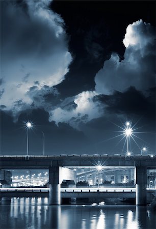 simsearch:400-04702280,k - City night scene of bridge with dramtic clouds in sky. Photographie de stock - Aubaine LD & Abonnement, Code: 400-04695113