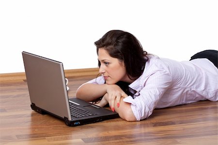 Young woman working at home Photographie de stock - Aubaine LD & Abonnement, Code: 400-04695898