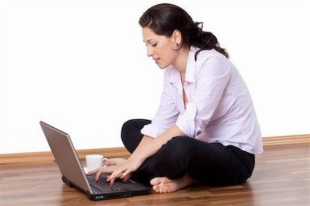 Young woman working at home Stock Photo - Budget Royalty-Free & Subscription, Code: 400-04695902