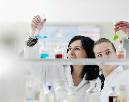 young woman students group in bright chemistry  lab Stock Photo - Budget Royalty-Free & Subscription, Code: 400-04696014