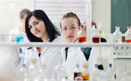 young woman students group in bright chemistry  lab Stock Photo - Budget Royalty-Free & Subscription, Code: 400-04696013