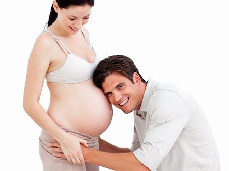 simsearch:400-07322828,k - Loving couple expecting a baby against a white background Fotografie stock - Microstock e Abbonamento, Codice: 400-04696660