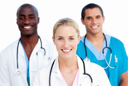 surgical team - Portrait of enthusiastic medical team against a white background Stock Photo - Budget Royalty-Free & Subscription, Code: 400-04696674