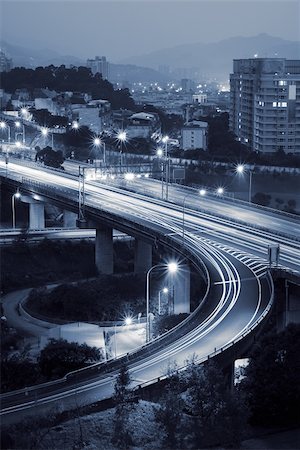 schienenkreuzung - Cityscape of interchange traffic system in the night. Stockbilder - Microstock & Abonnement, Bildnummer: 400-04696717