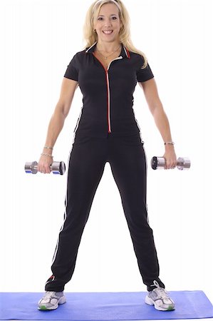 simsearch:400-04366347,k - woman lifting weights on floor mat Foto de stock - Super Valor sin royalties y Suscripción, Código: 400-04696814