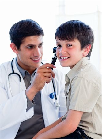 simsearch:400-06874781,k - Charming doctor examining little boy's ears at the practice Stock Photo - Budget Royalty-Free & Subscription, Code: 400-04697238