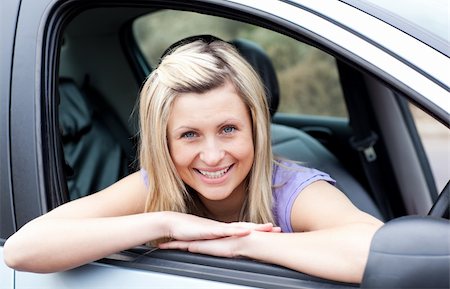 Portrait of a happy young female driver Stock Photo - Budget Royalty-Free & Subscription, Code: 400-04697372